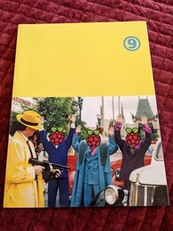 Cover of the 9front Dash 1 manual, CALLING DTRACY edition. Primarily yellow and features the 9front logo in the upper corner. Also features an image of Dick Tracy arresting three individuals who have had their heads replaced with Raspberry Pi logos 