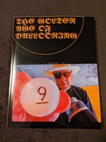 9front Golden Age of Ballooning manual. Features a photo of a man holding a white ball with the number 9 on it and showing it to the viewer