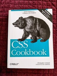 O'Reilly CSS Cookbook cover. Featuring a grizzly bear squatting on the title