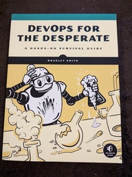 Devops for the Desperate cover. Featuring a robot surrounded by various beakers and flasks. One has blown up and another is overflowing. The robot appears to be concerned