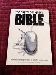 The Digital Designer's Bible cover. Features a computer mouse with several tools protruding from it to make it kind of look like a Swiss army knife