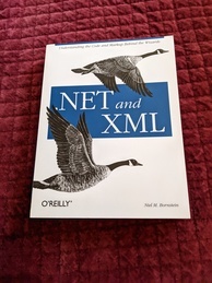 Cover of the O'Reilly Media .NET and XML book. Featuring two canada geese flying alongside the logo