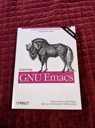 Learning GNU Emacs book cover from O'Reilly. Features an image of a gnu standing on the logo