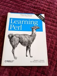 Learning Perl O'Relly Media book cover. Features an image of a llama.