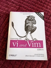Learning the vi and Vim Editors O'Reilly Media book cover. Features an image of a tarsier standing on the logo
