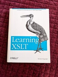 Learning XSLT O'Reilly Media book cover. Features an image of a marabou stork