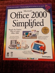 Microsoft Office 2000 Simplified book cover. Features antropormorphic floppy disks performing various word processing tasks. 'Over 6 million satisfied users!', boasts the cover.