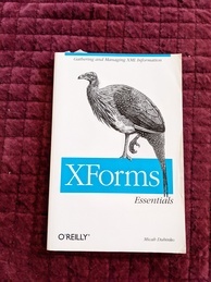 Cover of the XForms Essentials O'Reilly book. Features an image of a vulturine guineafowl standing on the logo.