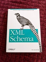 Cover of the XML Schema O'Reilly book. Features an image of a Reeves's Pheasant standing on top of the logo.