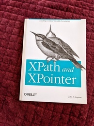 Cover of the XPath and XPointer O'Reilly book. Features an image of a pair of Bee-eater birds