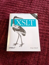 Cover of the XSLT O'Reilly book, second edition. Features an image of a jabiru stork and a banner announcing the second edition