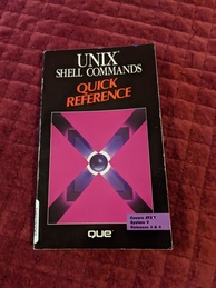 UNIX Shell Commands Quick Reference book cover. Features a reddish square with some gradients in an 'X' shape with additional gradients that make the lines look similar to arrows. Features a sphere in the center ringed by four white lights