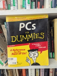 PCs for Dummies book cover. Boasts things like , 'Includes brand-new coverage of the Internet and e-mail'